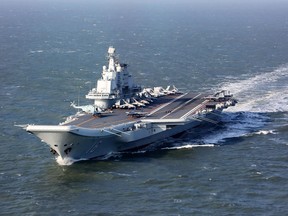 This file photo taken on December 24, 2016 shows the Liaoning, China's only aircraft carrier, sailing during military drills in the Pacific