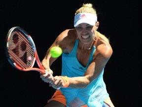Germany's Angelique Kerber hits a return against Germany's Carina Witthoeft during their women's singles match on day three of the Australian Open in Melbourne on Wednesday.