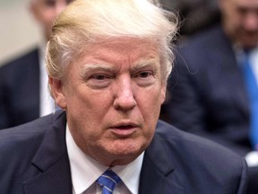 US President Donald Trump meets with business leaders in the Roosevelt Room at the White House in Washington, DC, on January 23, 2017.