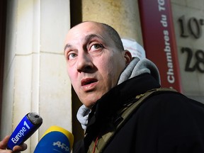 Vjeran Tomic, the main suspect in the case of the 2010 theft of five masterpieces from the Paris Modern Art Museum, arrives to his trial on January 30, 2017 at the Court house in Paris.