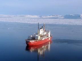 The CCGS Amundsen, Canada's only research ice-breaker, navigates near an ice floe along Devon Island in the High Arctic in September, 2015.