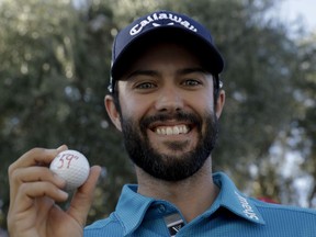 Adam Hadwin poses after shooting a 59 to take the third-round lead in the PGA Tour's CareerBuilder Challenge golf tournament at La Quinta Country Club on Saturday, Jan. 21, 2017.