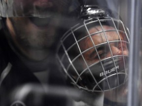 Singer Justin Bieber, who is playing for Team Gretzky, is pushed into the glass by Chris Pronger of Team Lemieux during the first period of the NHL All-Star Celebrity Shootout at Staples Center, Saturday, Jan. 28, 2017, in Los Angeles. The NHL All-Star Game is scheduled to be played at Staples Center on Sunday.