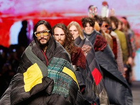 Models walk the runway during Etro's Fall 2017 menswear collection show, part of Milan Fashion Week on January 16, 2017 in Milan, Italy.