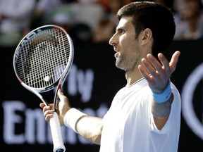 Serbia's Novak Djokovic gestures while playing Uzbekistan's Denis Istomin during their second round match at the Australian Open tennis championships in Melbourne, Australia, Thursday, Jan. 19, 2017.