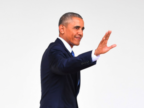 Barack Obama waves as he leaves the Oval Office for the last time as president, Jan. 20, 2017.