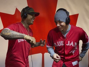 Toronto Blue Jays' Marcus Stroman, left, and teammate Ryan Goins listen to music for a social media stream as the team appears during their winter tour, in Toronto on Friday, January 20, 2017.