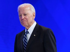 Joe Biden arrives to address the assembly on the second day of the World Economic Forum, on January 18, 2017 in Davos