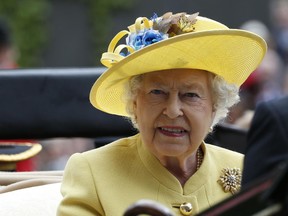 Queen Elizabeth II arrives on the first day of the Royal Ascot horse race meeting at Ascot, England on June, 14, 2016. ﻿﻿Buckingham Palace said Sunday Jan. 1, 2017 that Queen Elizabeth II was not well enough to attend a New Year's Day church service.
