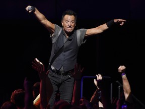 Bruce Springsteen interacts with the crowd during his concert with the E Street Band at the Los Angeles Sports Arena on Tuesday, March 15, 2016, in Los Angeles