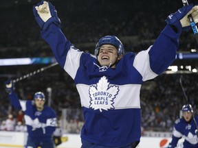 Toronto Maple Leafs forward Mitch Marner (centre) celebrates his goal in the Centennial Classic on Jan. 1.
