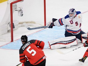 Team Canada defenceman and Ottawa Senators prospect Thomas Chabot (left) scores in the world junior hockey gold medal game in Montreal on Jan. 5.