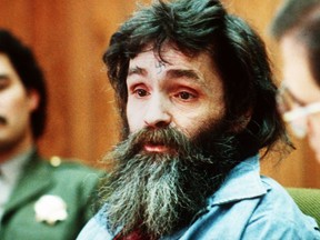 FILE - In this 1986 file photo, Charles Manson is seen in court. Amid reports that Charles Manson has been taken from his California prison cell to a hospital, a state corrections official would confirm only that the 82-year-old killer and cult leader was still alive. Both TMZ and the Los Angeles Times reported Tuesday, Jan. 3, 2017 that Manson had been hospitalized. (AP Photo/File)