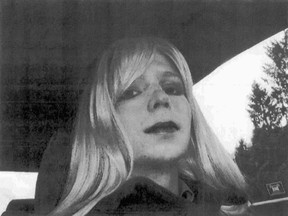 FILE - In this undated file photo provided by the U.S. Army, Pfc. Chelsea Manning poses for a photo wearing a wig and lipstick. On Tuesday, Jan. 17, 2017, President Barack Obama commuted the sentence of Chelsea Manning, who leaked Army documents and is serving 35 years.