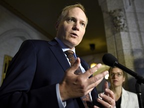 NDP MP Peter Julian speaks to reporters Oct. 19, 2016 in Ottawa.