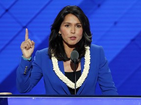 In this July 26, 2016, file photo, Rep. Tulsi Gabbard, D-Hawaii, speaks at the Democratic National Convention in Philadelphia. Gabbard says she met with Syrian President Bashar Assad during a recent trip to the war-torn country.