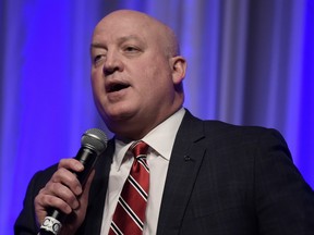 In this March 19, 2015 file photo, NHL deputy commissioner Bill Daly speaks at a press conference in Edmonton.