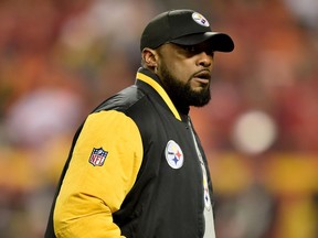 Pittsburgh Steelers coach Mike Tomlin walks the sideline against the Kansas City Chiefs on Jan. 15.
