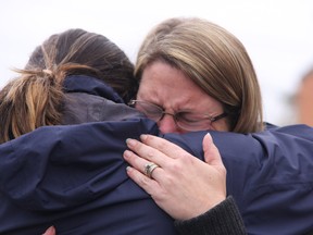 Geoff Gaston's widow, Tanya, hugs a friend after Marcello Fracassi was found guilty of drunk driving causing death on Tuesday Nov. 1, 2016 in Barrie.