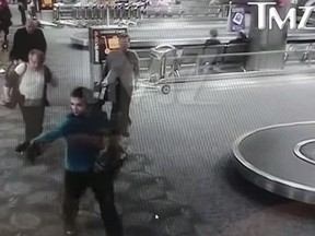 A still from surveillance video that appears to show a gunman opening fire in Fort Lauderdale airport on Friday.