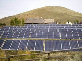 This Aug. 27, 2015, file photo shows a solar power array that is part of sustainability improvements at the Lamar Buffalo Ranch in Yellowstone National Park, Wyo.