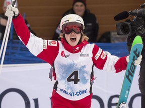 Justine Dufour-Lapointe celebrates her victory at the women's freestyle moguls World Cup on Jan. 21.
