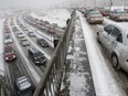 Traffic on the Gardiner Expressway, seen in this 2007 file photo. Environment Canada is cautioning that an all-day snowfall could make for a sloppy Tuesday commute.