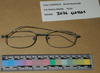 Eye glasses found in ashes at the acreage, north of Calgary, where Douglas Garland lived with his parents.