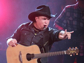 Country singer Garth Brooks performs at the Saddledome in Calgary on July 12, 2012.