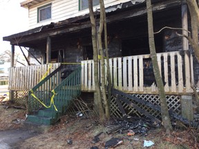 A firebombed damaged home in Halifax's west end on Tuesday Jan. 3, after, police say, a family of four — a couple and their two children — were forced to flee after someone in a white vehicle tossed an incendiary device at the two-storey home just before midnight.