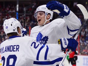 Auston Matthews (right) leads the Toronto Maple Leafs in goals and points.