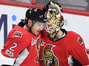 Senators defenceman Dion Phaneuf congratulates goalie Mike Condon on his 3-0 shutout win against the Washington Capitals during their game in Ottawa on Tuesday night.