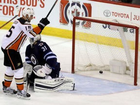 Anaheim Ducks' Ryan Getzlaf scores on Winnipeg Jets goaltender Ondrej Pavelec during the third period in Winnipeg on Monday.
