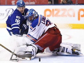 Toronto Maple Leafs centre Mitchell Marner is stopped by New York Rangers goalie Henrik Lundqvist during the second period in Toronto on Thursday.