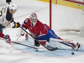 Canadiens goaltender Carey Price makes a save on Buffalo Sabres' Sam Reinhart during third period  of game  Saturday in Montreal.