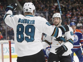 San Jose Sharks' Mikkel Boedker and Melker Karlsson celebrate a goal against the Oilers during first period action in Edmonton on Tuesday night.