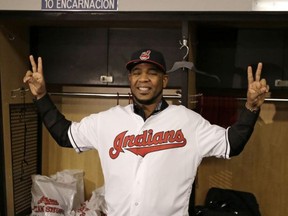 Former Toronto Blue Jay Edwin Encarnacion smiles in his new Cleveland jersey on Jan. 5.
