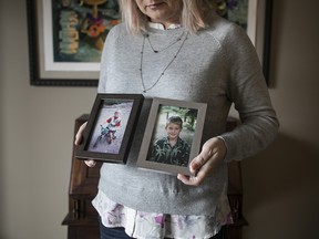Tamara McLean, the mother of  Tevis Gonyou-McLean, a young man that tried to join ISIL, is seen in her home holding childhood photos of Tevis, in Ottawa, January 29, 2017.