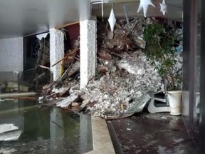 This photo taken from a video shows the snow inside the Hotel Rigopiano following an avalanche in Farindola, Italy, early Thursday, Jan. 19, 2017