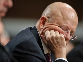 Director of National Intelligence James Clapper listens to questions on Capitol Hill in Washington, Thursday, Jan. 5, 2017.