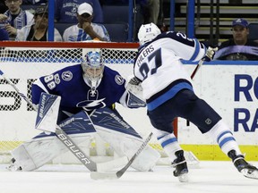 Winnipeg Jets right wing Nikolaj Ehlers scores past Tampa Bay Lightning goalie Andrei Vasilevskiy on a penalty shot during the second period Tuesday in Tampa, Fla.