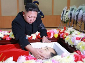 Kim Jong-Un pays his final respects to an alternate member of the Central Committee of the Workers' Party of Korea, Kang Ki Sop. The photo was released Jan. 20, 2017.