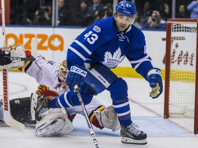 theScore on X: VIDEO: Leafs' Nazem Kadri threatens Mark Giordano with  throat-slash gesture after big hit.    / X