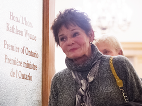 Libby Keenan leaves Kathleen Wynne's office on Wednesday after speaking with premier about soaring hydro bills.