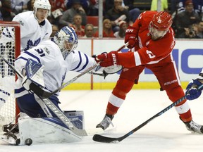 Toronto Maple Leafs goalie Frederik Andersen stops a shot by the Red Wings' Riley Sheahan in the second period of their game Wednesday night in Detroit.