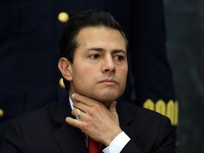 Mexico's President Enrique Pena Nieto pauses during a press conference at Los Pinos presidential residence in Mexico City, Monday, Jan. 23, 2017