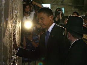 Barack Obama visits the Jewish Western Wall in the Jerusalem old city in the early morning on July 24, 2008.