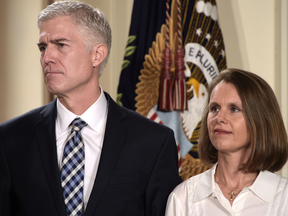 Judge Neil Gorsuch and his wife Marie Louise watch as U.S. President Donald Trump nominated him for the Supreme Court on Jan. 31, 2017.