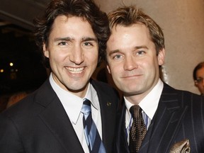Justin Trudeau and Seamus O'Regan, pictured here at a charity event in Ottawa in 2009, have long had a close personal friendship.