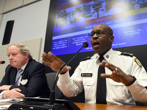 Chief Mark Saunders speaks during a news conference as Andy Pringle, chairman of the police services board, listens, Thursday, Jan. 26, 2017.